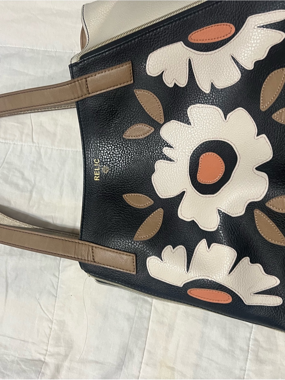 Relic Black Shoulder Tote with Cream Floral Appliqués and Brown/Tan Straps
